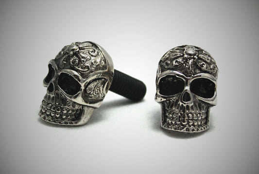 Tribal skull motorcycle bolts pair front view