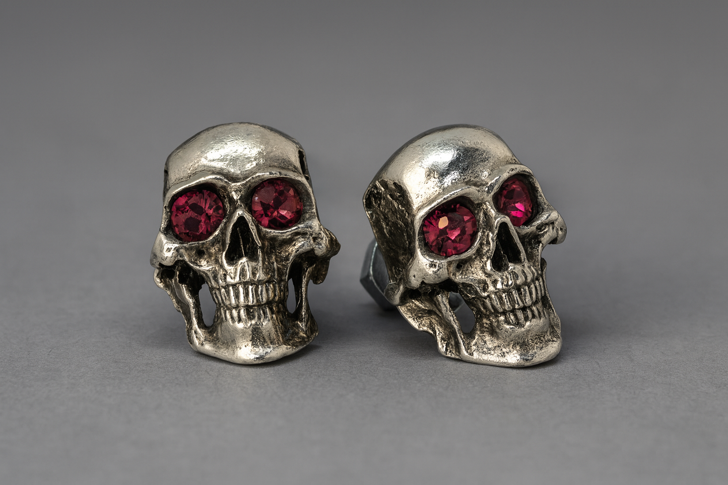 Pink eyes skull bolts pair front view