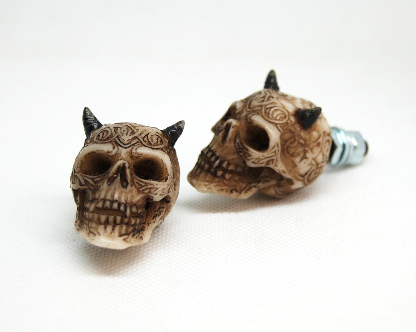 Custom motorcycle skull bolts close-up